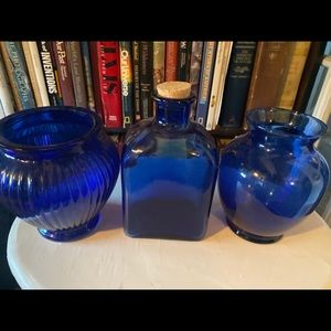 Blue glass bottles and vases